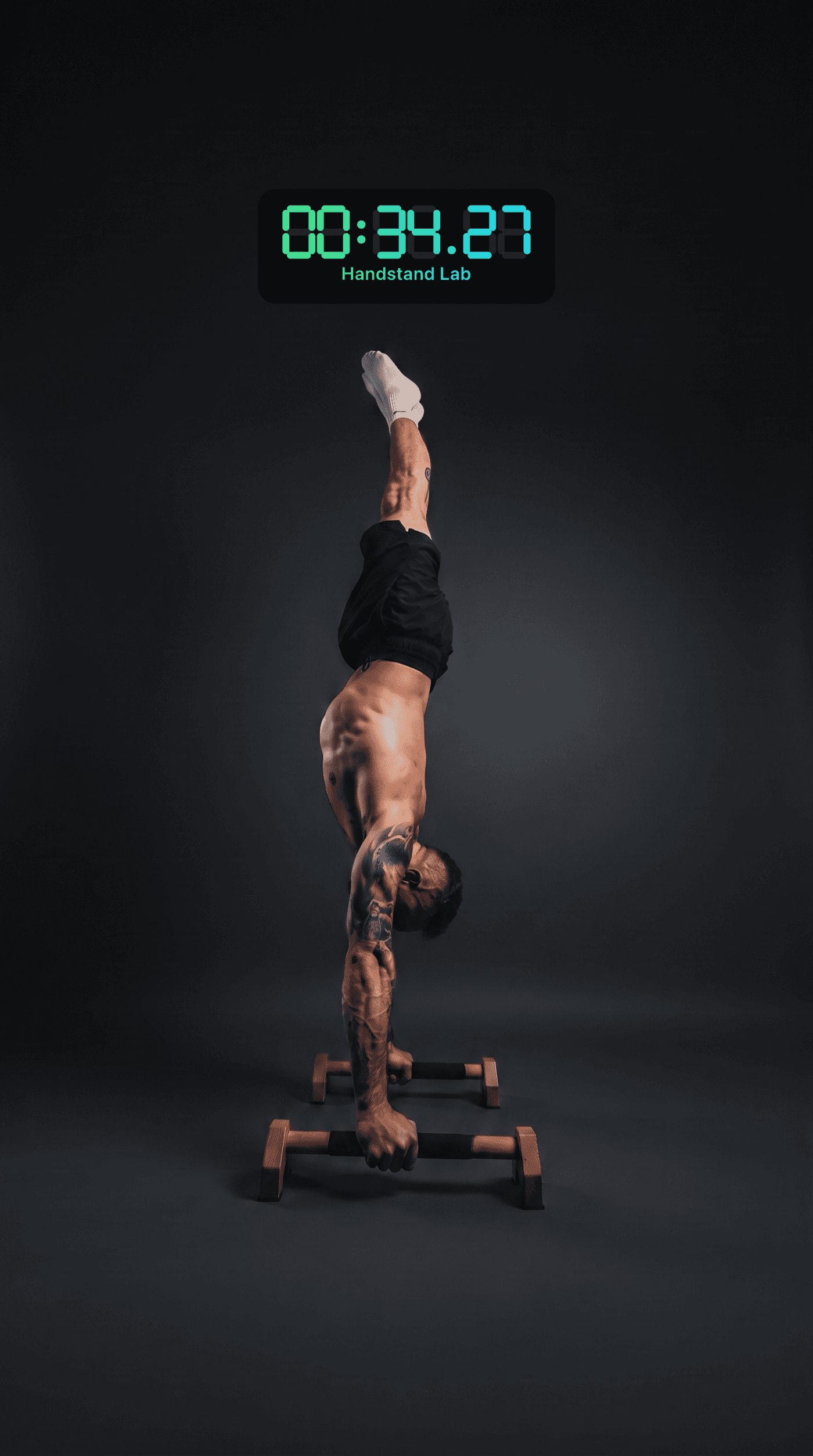 Handstand with the automatic timer reading 34.27 seconds